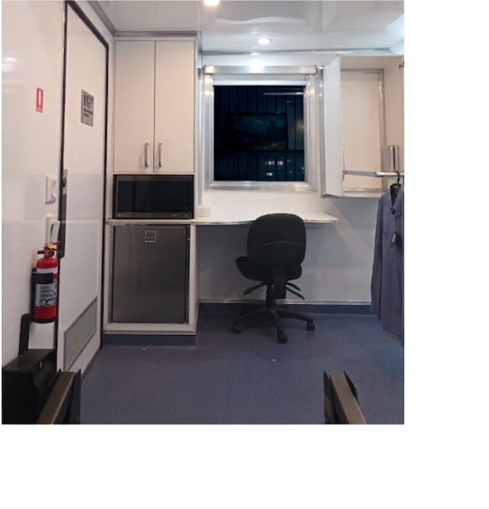 Desk and kitchenette area inside the Mobile Access Facility