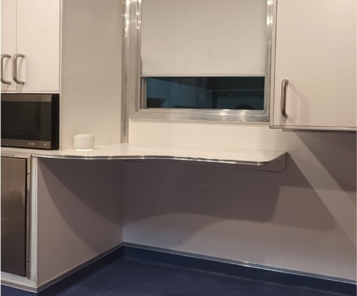 Kitchen bench and cupboards inside the Mobile Access Facility