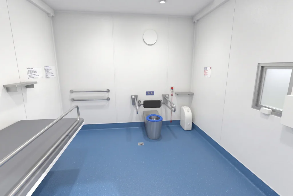 Concept render of the Fortitude Essentials Essential Access Pod, adult change room, interior toilet area with grab rails and change table.
